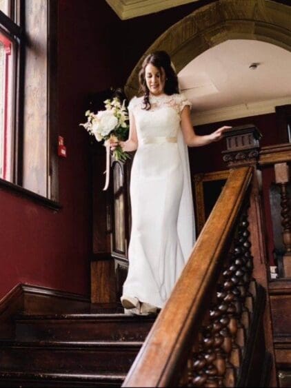 One of our gorgeous BOA Brides. This is Sarah wearing a fabulous silk gown with a fine lace bolero and sash.
