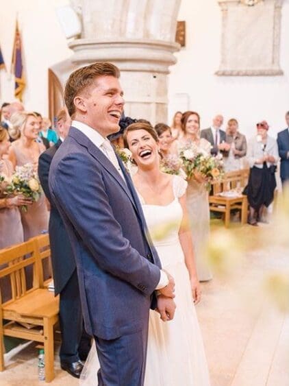 Look how happy new bride Steff and her groom are. Steff wore a silk chiffon bridal gown. Summer 2016.