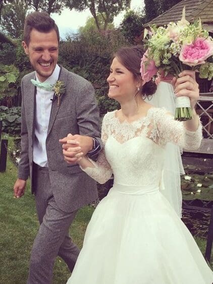 Thank you Amanda for this wonderful picture of your August 2016 wedding. wearing a stunning silk and lace gown from BOA Boutique.