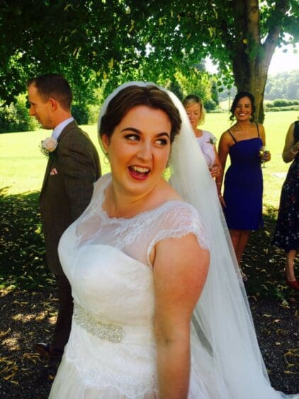 How lovely and happy Claire looks on her special day. Wearing an Ivory and Co gown with bespoke bolero and finished with a crystal sash. Thank you for the photograph Claire. August 2016.