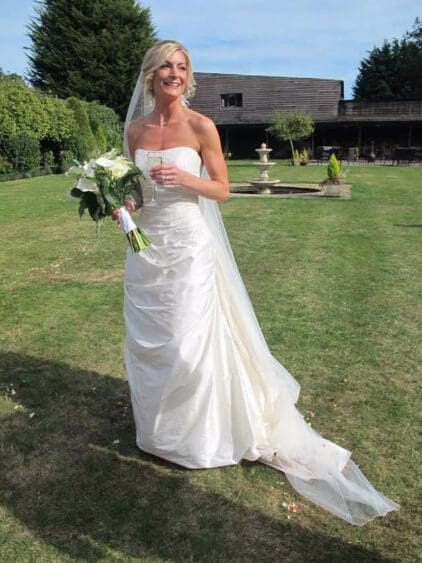 Emily looks absolutely stunning in her strapless silk gown from her Sept 2016 wedding. Thank you so much for the beautiful picture Emily.